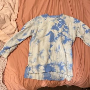 Blue tie dye sweater with slight stain.